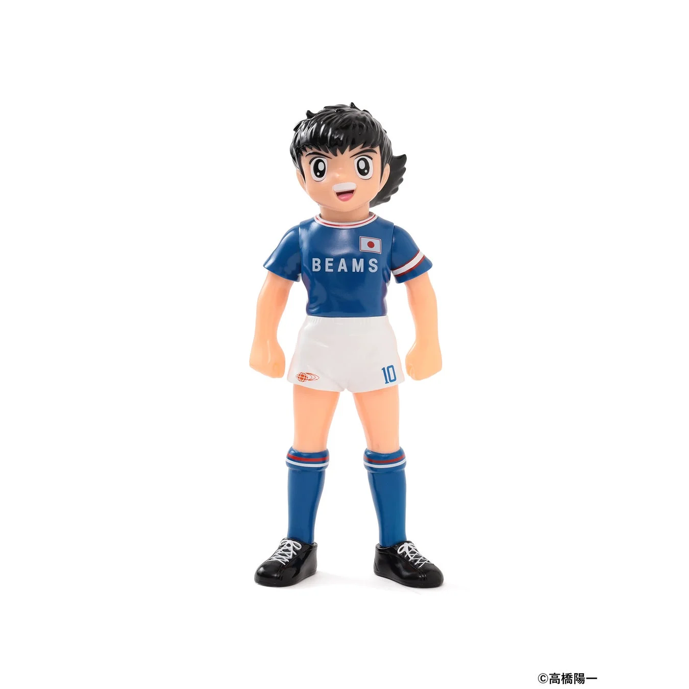 青いサッカーユニフォーム姿のアニメキャラクターフィギュア。人気漫画「キャプテン翼」の大空翼を模したデザイン